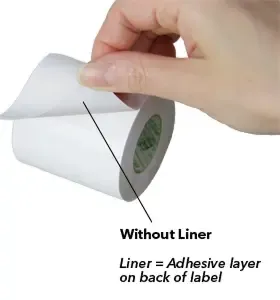 Liner less label with adhesive on one side being peeled.