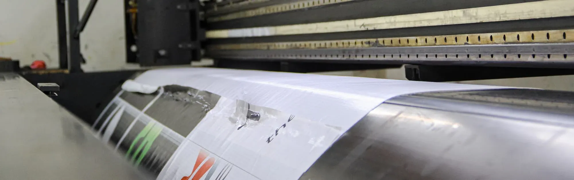 An image of a large printer printing some labels.